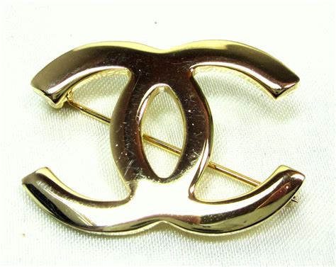 chanel logo brooch replica|vintage chanel brooch.